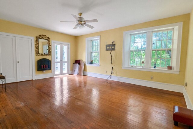 23 Gracemere, Tarrytown, NY 10591 - unfurnished living room featuring wood finished floors, a ceiling fan, and french doors
