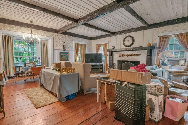 23 Gracemere, Tarrytown, NY 10591 - living room featuring a chandelier, beam ceiling, wood-type flooring, and a fireplace