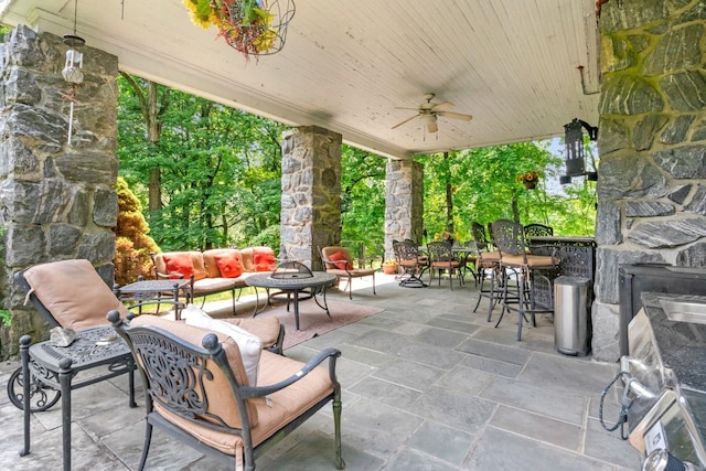 23 Gracemere, Tarrytown, NY 10591 - view of patio featuring a ceiling fan, outdoor dining area, and an outdoor living space with a fireplace