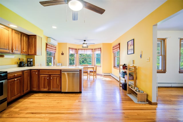 322 Union School Rd, Middletown, NY 10941 - kitchen featuring stainless steel dishwasher, baseboard heating, a ceiling fan, a peninsula, and brown cabinets
