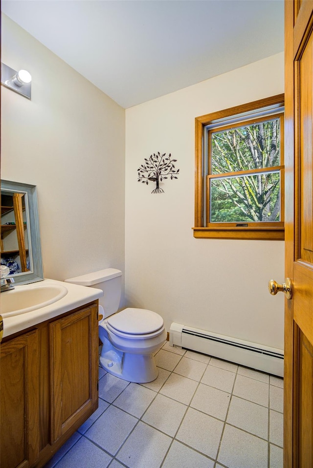 322 Union School Rd, Middletown, NY 10941 - bathroom with baseboard heating, vanity, and tile patterned flooring