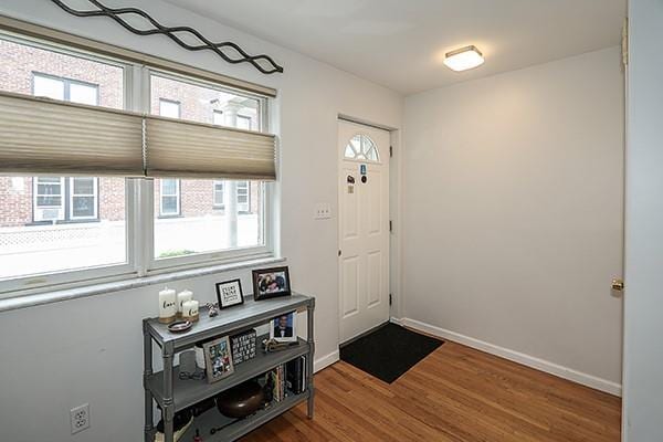 183 Atlantic Ave Unit 8, Lynbrook, NY 11563 - foyer entrance with plenty of natural light and wood finished floors