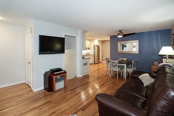 183 Atlantic Ave Unit 8, Lynbrook, NY 11563 - living area featuring ceiling fan and light wood-type flooring