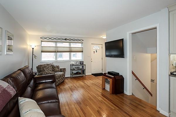 183 Atlantic Ave Unit 8, Lynbrook, NY 11563 - living area featuring wood finished floors