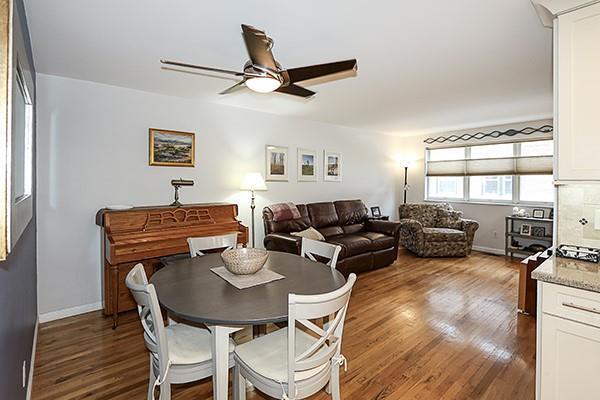 183 Atlantic Ave Unit 8, Lynbrook, NY 11563 - dining area featuring ceiling fan and wood finished floors