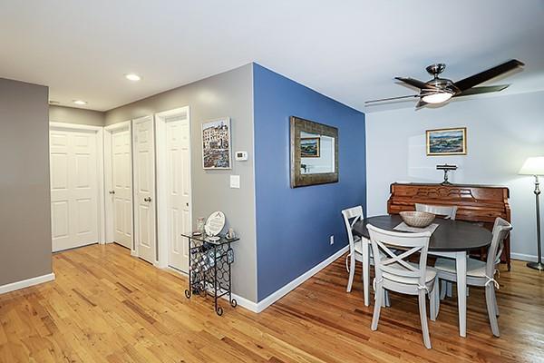 183 Atlantic Ave Unit 8, Lynbrook, NY 11563 - dining room featuring light wood-style floors, a ceiling fan, and recessed lighting