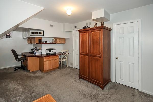 183 Atlantic Ave Unit 8, Lynbrook, NY 11563 - office space with carpet floors and built in study area