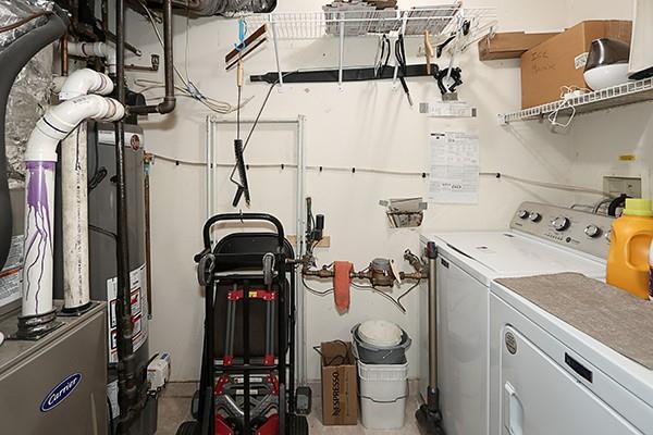 183 Atlantic Ave Unit 8, Lynbrook, NY 11563 - laundry area featuring washer and clothes dryer