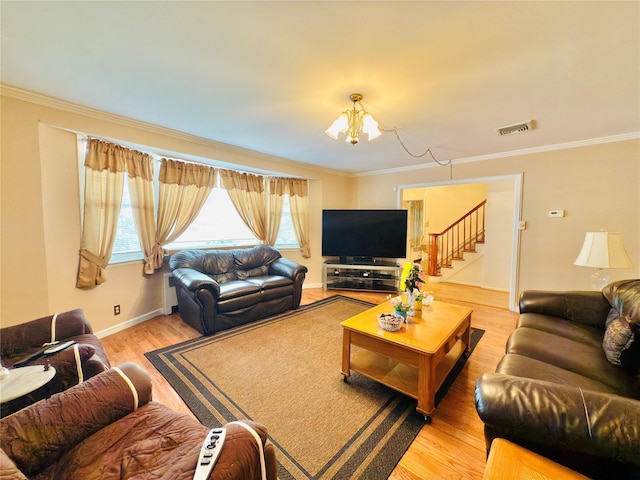 945 Swinton Ave, Bronx, NY 10465 - living area featuring a chandelier, crown molding, light wood-style flooring, and stairs