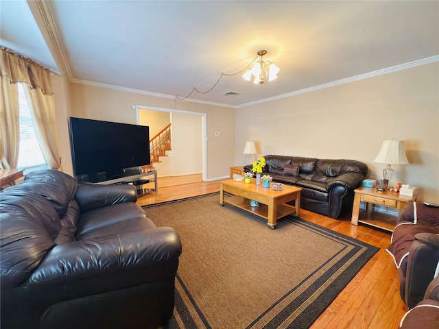 945 Swinton Ave, Bronx, NY 10465 - living room featuring ornamental molding, wood-type flooring, stairs, and a chandelier