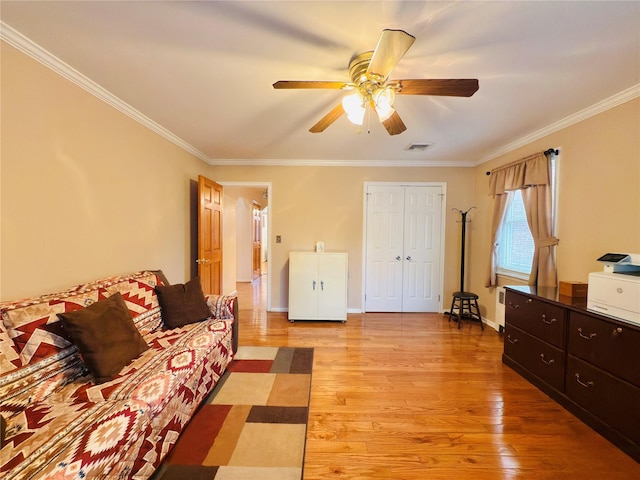 945 Swinton Ave, Bronx, NY 10465 - living area with light wood-type flooring, ceiling fan, and ornamental molding