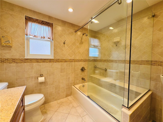 945 Swinton Ave, Bronx, NY 10465 - bathroom featuring tile walls, vanity,  shower combination, tile patterned floors, and recessed lighting