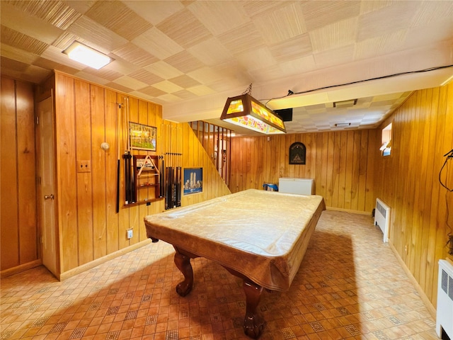 945 Swinton Ave, Bronx, NY 10465 - rec room with wood walls, billiards, radiator, and light floors