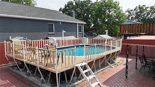 945 Swinton Ave, Bronx, NY 10465 - view of pool featuring a wooden deck and a patio area