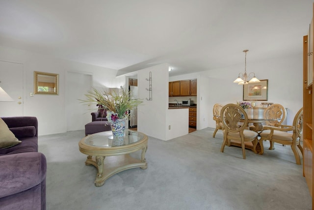 12 Scenic Dr Unit K, Croton-On-Hudson, NY 10520 - living room with a chandelier and light colored carpet