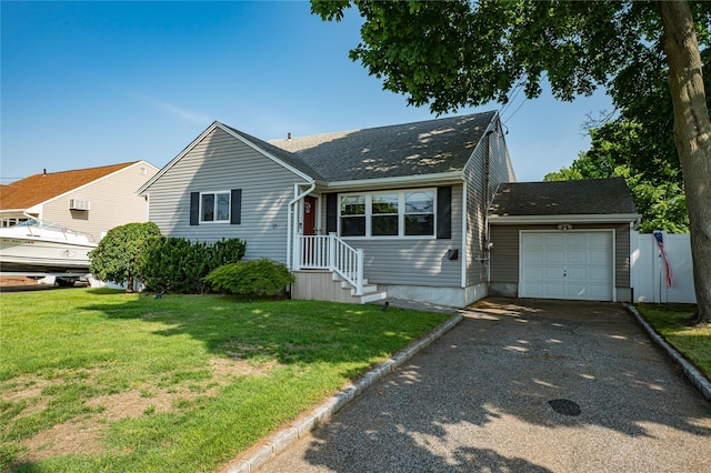17 Abbott St, West Babylon, NY 11704 - view of front of property with a garage, asphalt driveway, and roof with shingles