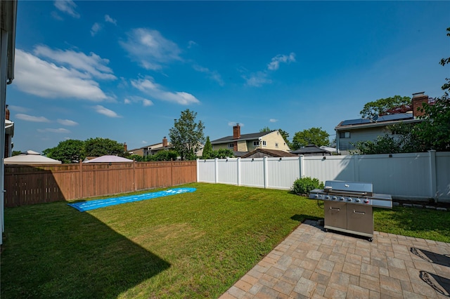 17 Abbott St, West Babylon, NY 11704 - fenced backyard with a patio