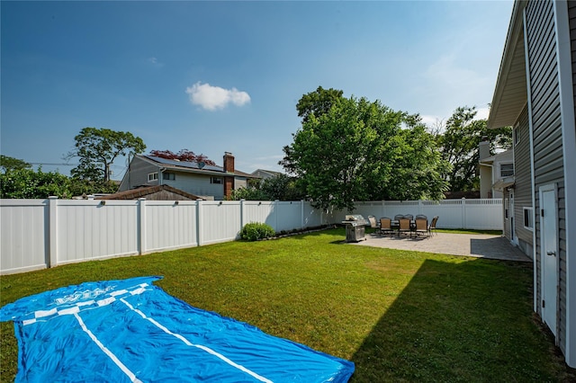 17 Abbott St, West Babylon, NY 11704 - fenced backyard featuring a patio area