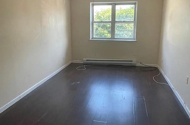 14808 35th Ave, Flushing, NY 11354 - unfurnished room featuring baseboard heating and wood-type flooring