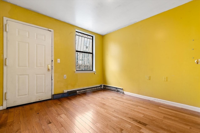 718 Garden St, Bronx, NY 10457 - entrance foyer featuring wood-type flooring and baseboards