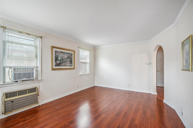 662 Benris Ave, Franklin Square, NY 11010 - unfurnished living room featuring wood finished floors, arched walkways, cooling unit, and ornamental molding