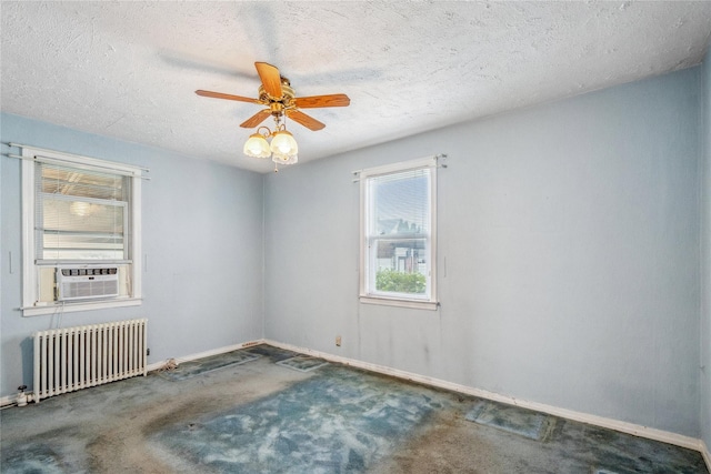 662 Benris Ave, Franklin Square, NY 11010 - unfurnished room with radiator, cooling unit, ceiling fan, carpet flooring, and a textured ceiling