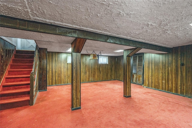 662 Benris Ave, Franklin Square, NY 11010 - basement with carpet floors, wooden walls, and stairway