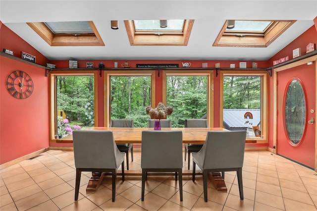 295 N Salem Rd, Waccabuc, NY 10597 - dining area with a skylight, healthy amount of natural light, and light tile patterned flooring