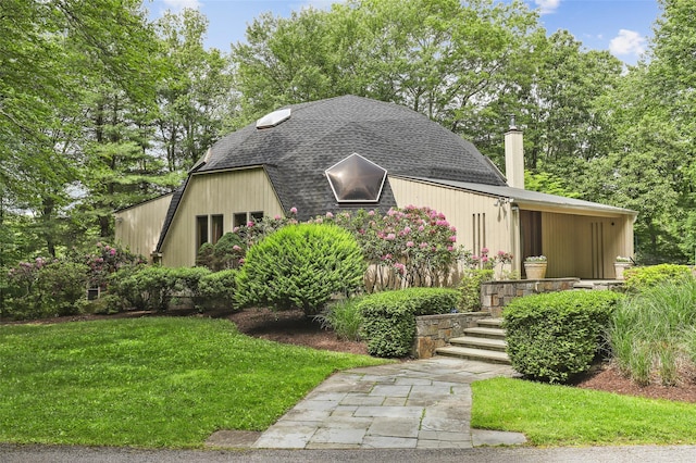 295 N Salem Rd, Waccabuc, NY 10597 - view of front of house featuring a chimney, a front lawn, and a shingled roof
