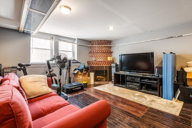 88-37 74th Ave, Glendale, NY 11385 - living area featuring hardwood / wood-style floors, a fireplace, and recessed lighting