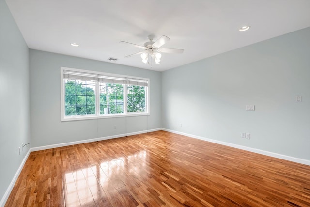 51 Highfield Ave, Port Washington, NY 11050 - empty room featuring ceiling fan, wood finished floors, and recessed lighting
