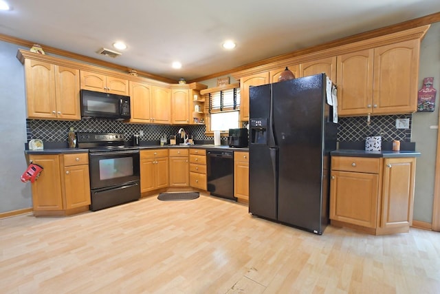 7 Amber Ln, Coram, NY 11727 - kitchen featuring black appliances, crown molding, dark countertops, light wood-style flooring, and open shelves