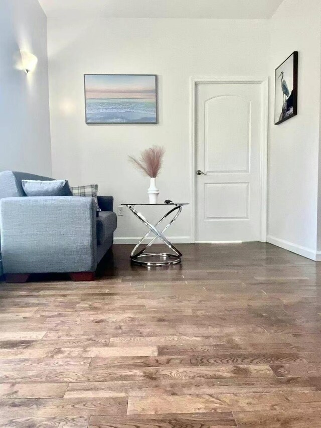 144-89 38th Ave Unit 5B, Flushing, NY 11354 - living area featuring wood finished floors and baseboards