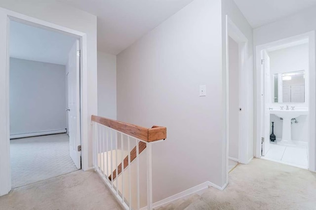13 Bayberry Ln, Rye Brook, NY 10573 - corridor with an upstairs landing, baseboard heating, and carpet