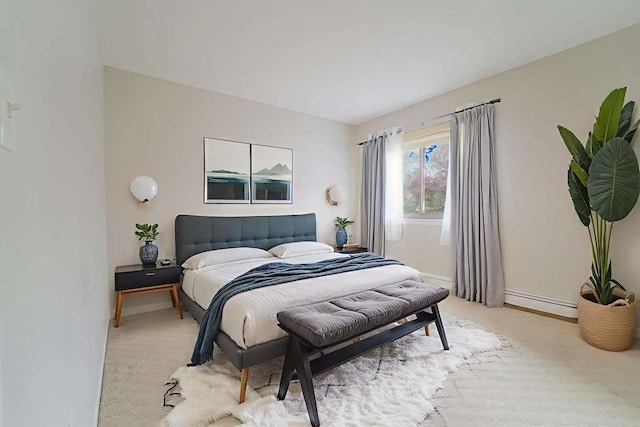 13 Bayberry Ln, Rye Brook, NY 10573 - bedroom featuring a baseboard heating unit and light carpet