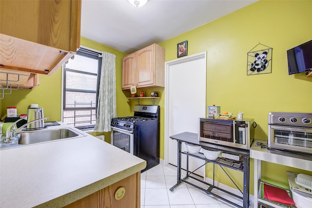 83-85 Woodhaven Blvd Unit 6F, Woodhaven, NY 11421 - kitchen with stainless steel appliances, light tile patterned flooring, light countertops, exhaust hood, and light brown cabinetry