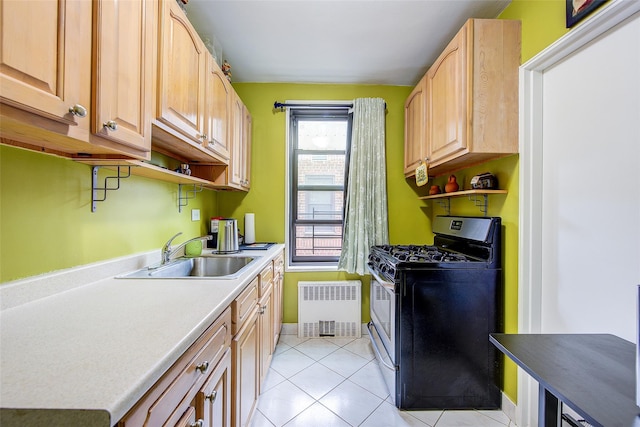 83-85 Woodhaven Blvd Unit 6F, Woodhaven, NY 11421 - kitchen with stainless steel range with gas cooktop, radiator, light brown cabinetry, light tile patterned flooring, and light countertops