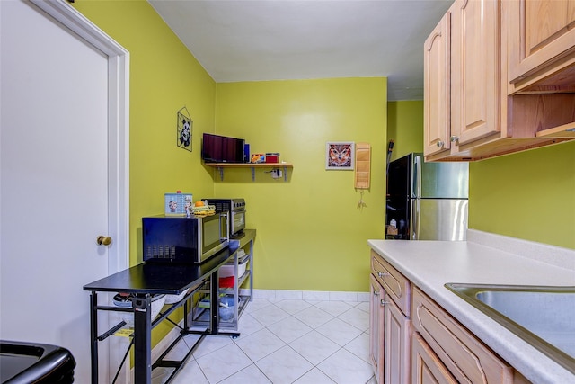 83-85 Woodhaven Blvd Unit 6F, Woodhaven, NY 11421 - kitchen featuring stainless steel appliances, light tile patterned flooring, and light countertops