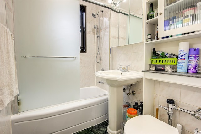 83-85 Woodhaven Blvd Unit 6F, Woodhaven, NY 11421 - full bathroom featuring tile walls, shower / bathtub combination, and tasteful backsplash