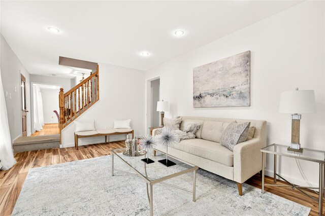 18 Jenkins Ct, Ossining, NY 10562 - living room featuring wood finished floors, stairway, and recessed lighting