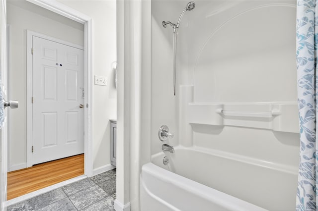 18 Jenkins Ct, Ossining, NY 10562 - bathroom featuring shower / bath combination with curtain and baseboards