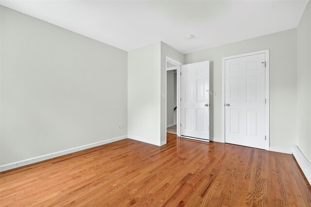 18 Jenkins Ct, Ossining, NY 10562 - unfurnished bedroom featuring light wood-type flooring and baseboards