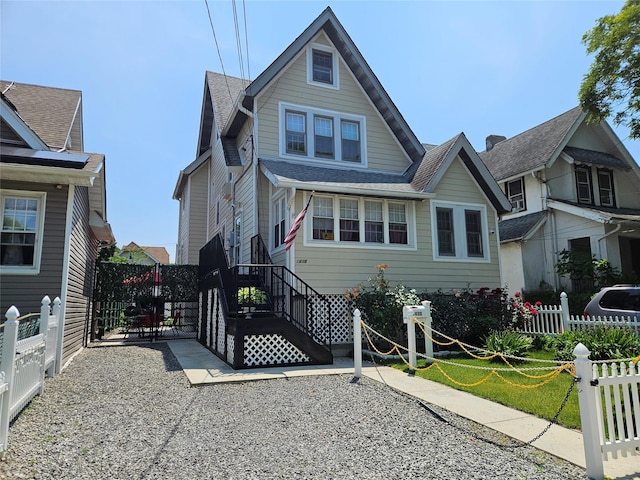 1430 Gipson St, Far Rockaway, NY 11691 - view of front facade featuring a shingled roof