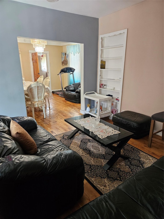 1430 Gipson St, Far Rockaway, NY 11691 - living room with a chandelier and wood finished floors