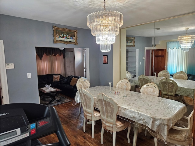 1430 Gipson St, Far Rockaway, NY 11691 - dining space featuring a chandelier and dark wood-style flooring