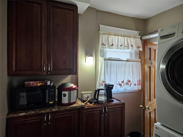 1430 Gipson St, Far Rockaway, NY 11691 - laundry room featuring stacked washer / drying machine