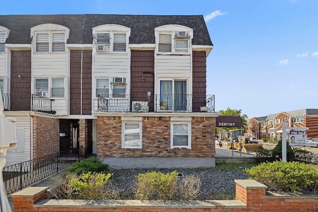 214-04 18th Ave, Bayside, NY 11360 - view of front of home with a residential view and a balcony