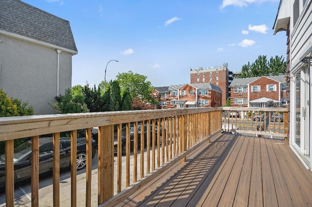 214-04 18th Ave, Bayside, NY 11360 - wooden terrace with a residential view