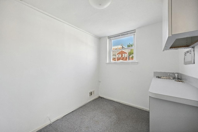 214-04 18th Ave, Bayside, NY 11360 - unfurnished dining area with baseboards
