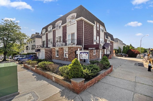 214-04 18th Ave, Bayside, NY 11360 - view of building exterior featuring a residential view